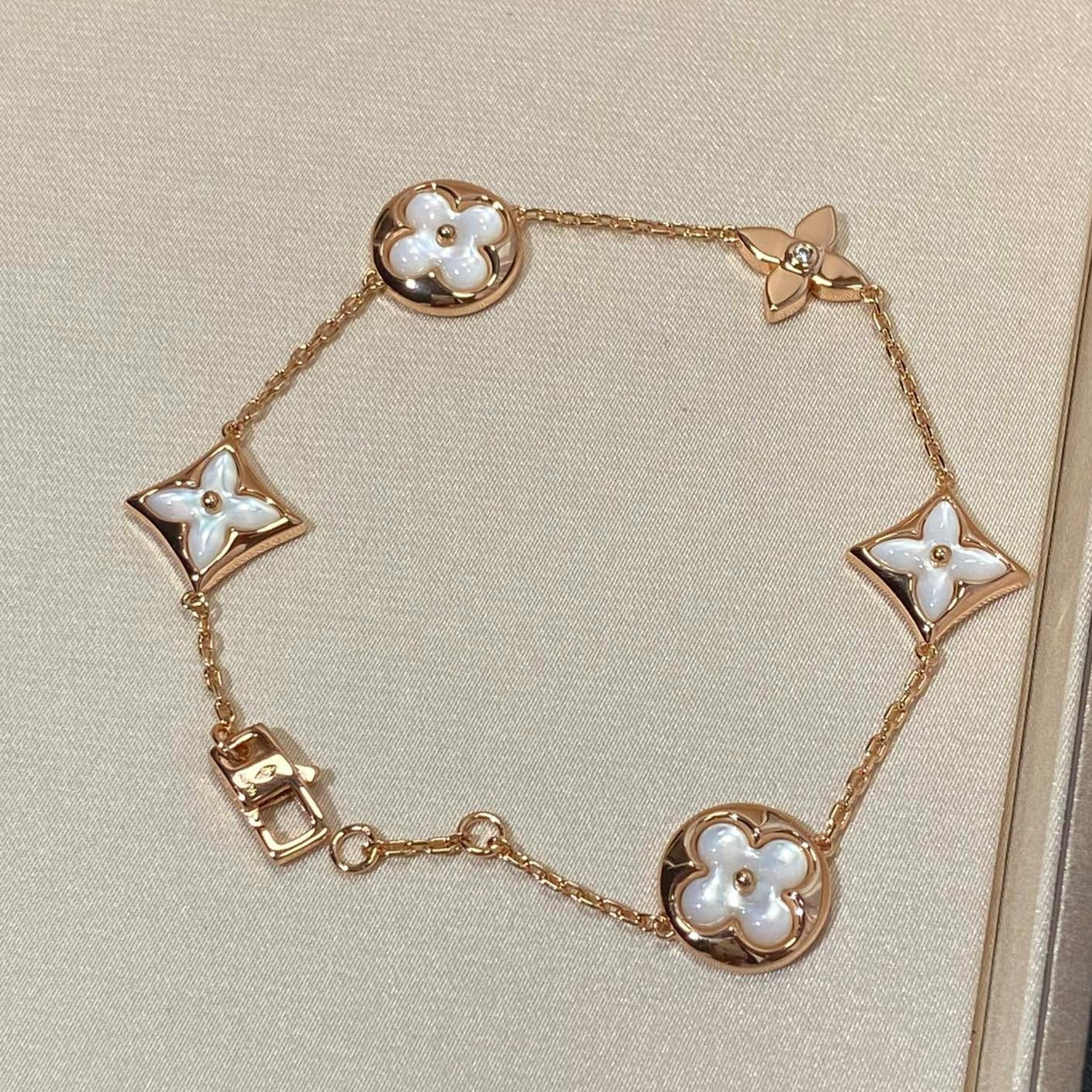 [Okajuri Jewelry]STAR AND SUN 5 MOTIF MOP PINK GOLD BRACELET