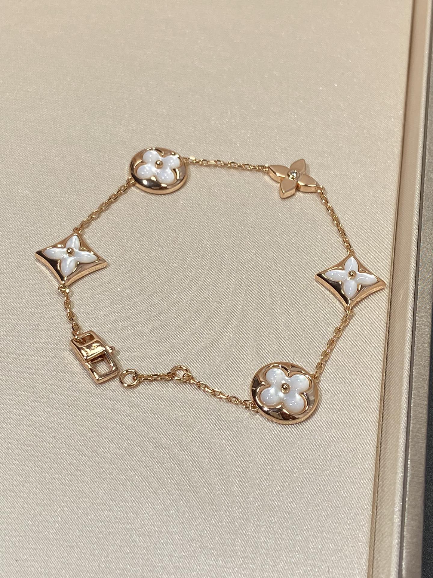 [Okajuri Jewelry]STAR AND SUN 5 MOTIF MOP PINK GOLD BRACELET